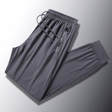 High-End Ice Silk Sports Pants Men's Summer Thin Stretch Breathable Quick-Drying Straight Loose plus Size Running Skinny Trousers